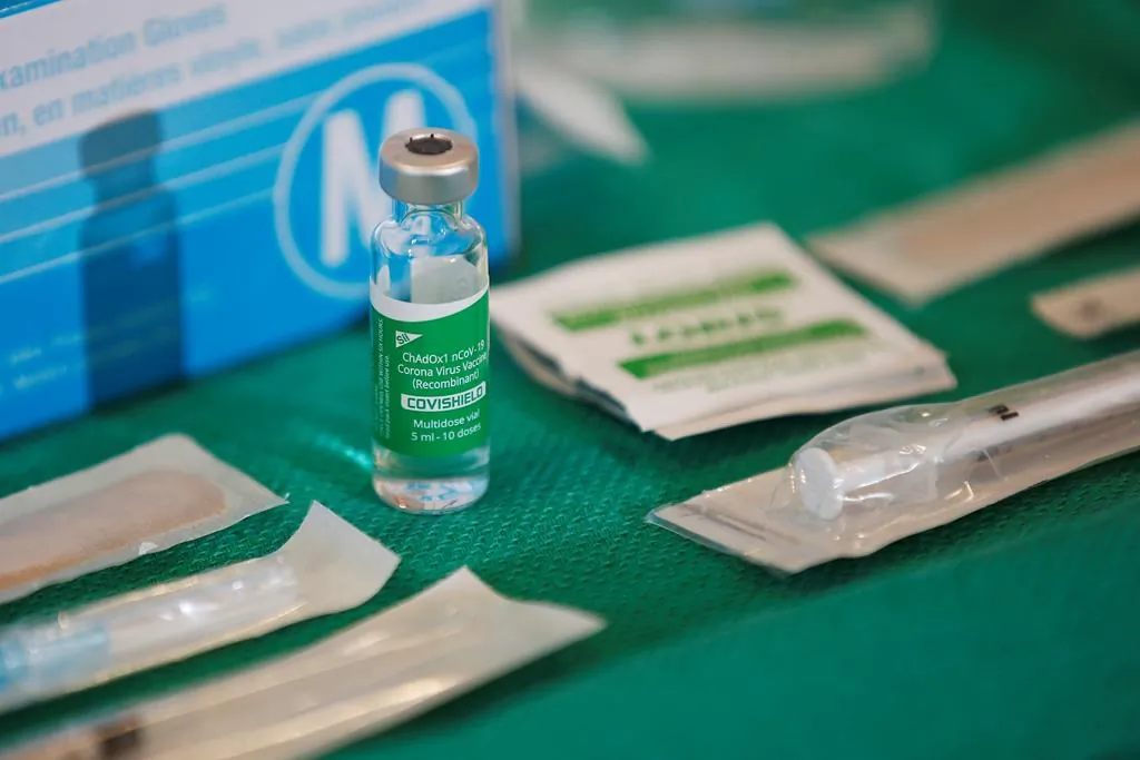 A vial of the AstraZeneca COVID-19 vaccine is seen with injection supplies at a clinic in Winnipeg, on March 19, 2021. (THE CANADIAN PRESS/John Woods)