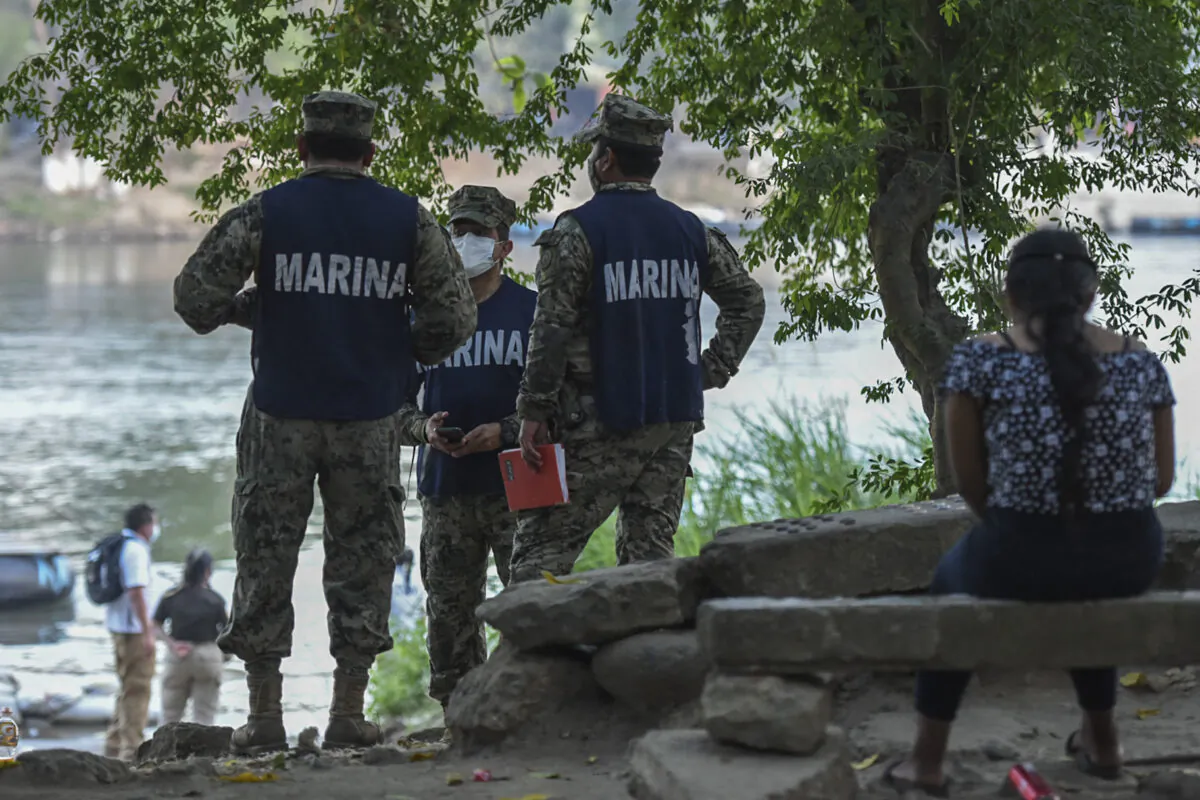 Mexican Marines patrol at the banks of the Suchiate River in Ciudad Hidalgo, Chiapas state, Mexico, on the border with Tecun Uman, Guatemala, on Jan. 19, 2021. (Isaac Guzman/AFP via Getty Images)