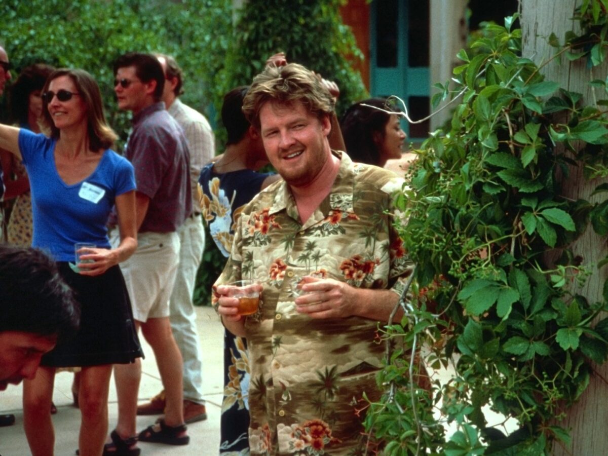 man in hawaiian shirt at party in 9 Movies That Demonstrate How to Do an Excellent Thing in a Woman's Presence