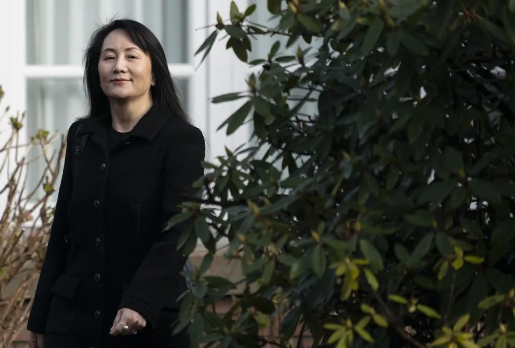 Chief Financial Officer of Huawei, Meng Wanzhou leaves her home in Vancouver, on March 25, 2021 to go to B.C. Supreme Court. (The Canadian Press/Jonathan Hayward)