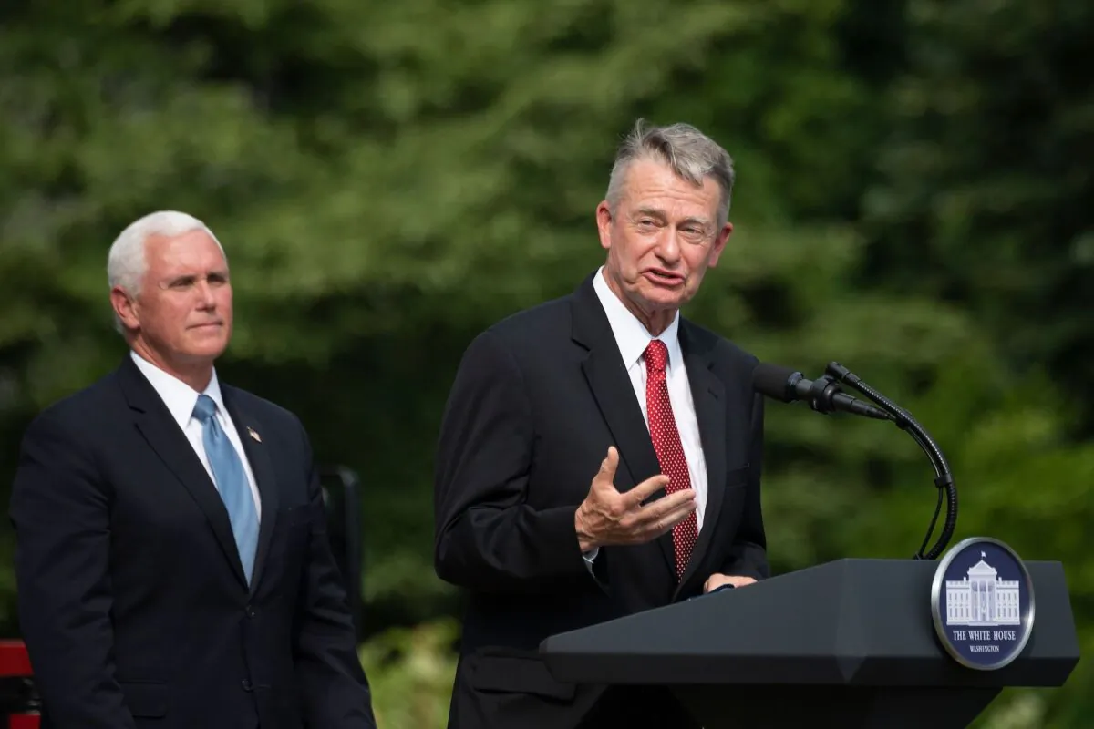 Idaho Gov. Brad Little speaks as then-Vice President President Mike Pence (L) listens at the White House in Washington, on July 16, 2020. (Jim Watson/AFP/Getty Images)