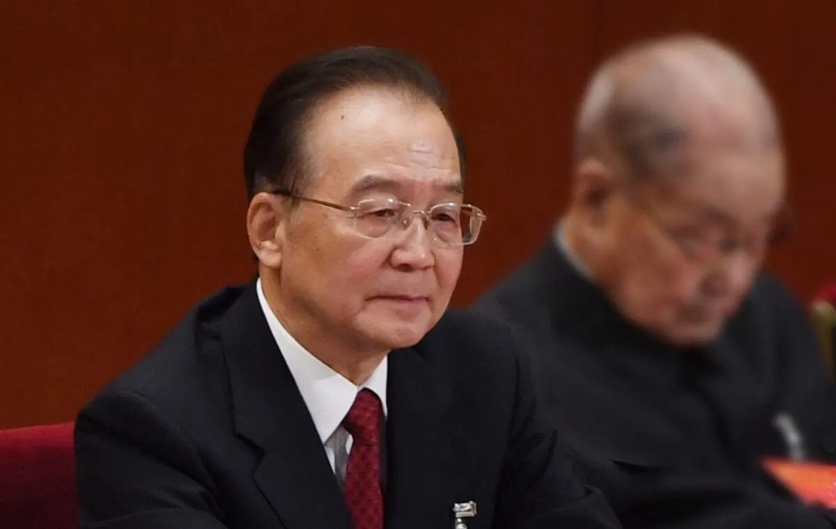 Former Chinese premier Wen Jiabao listens to speeches during the closing session of the rubber-stamp legislature’s congress in Beijing, China on Oct. 24, 2017. (GREG BAKER/AFP via Getty Images)