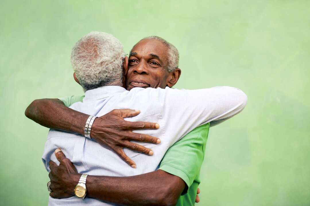 Hugs and handshakes connect us beyond the moment of contact. ( Diego Cervo/Shutterstock)