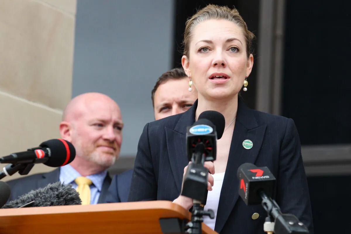 WA National Party leader Mia Davies addresses gold sector workers protesting outside Parliament House in Perth on Tuesday, Oct. 10, 2017. (AAP Image/Richard Wainwright)