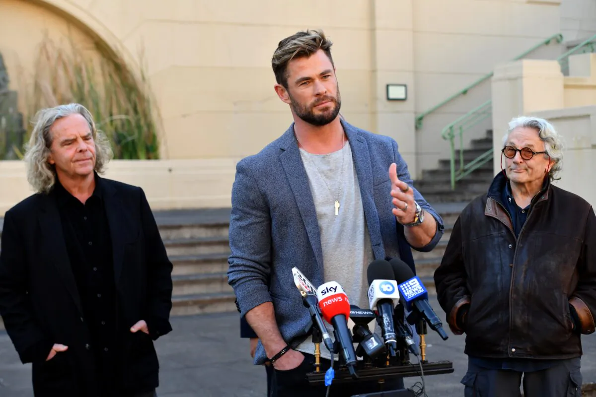 Producer Doug Mitchell, actor Chris Hemsworth and director George Miller at a press conference to announce the new Mad Max film at Fox Studios Australia in Sydney on April 19, 2021. (AAP Image/Mick Tsikas)