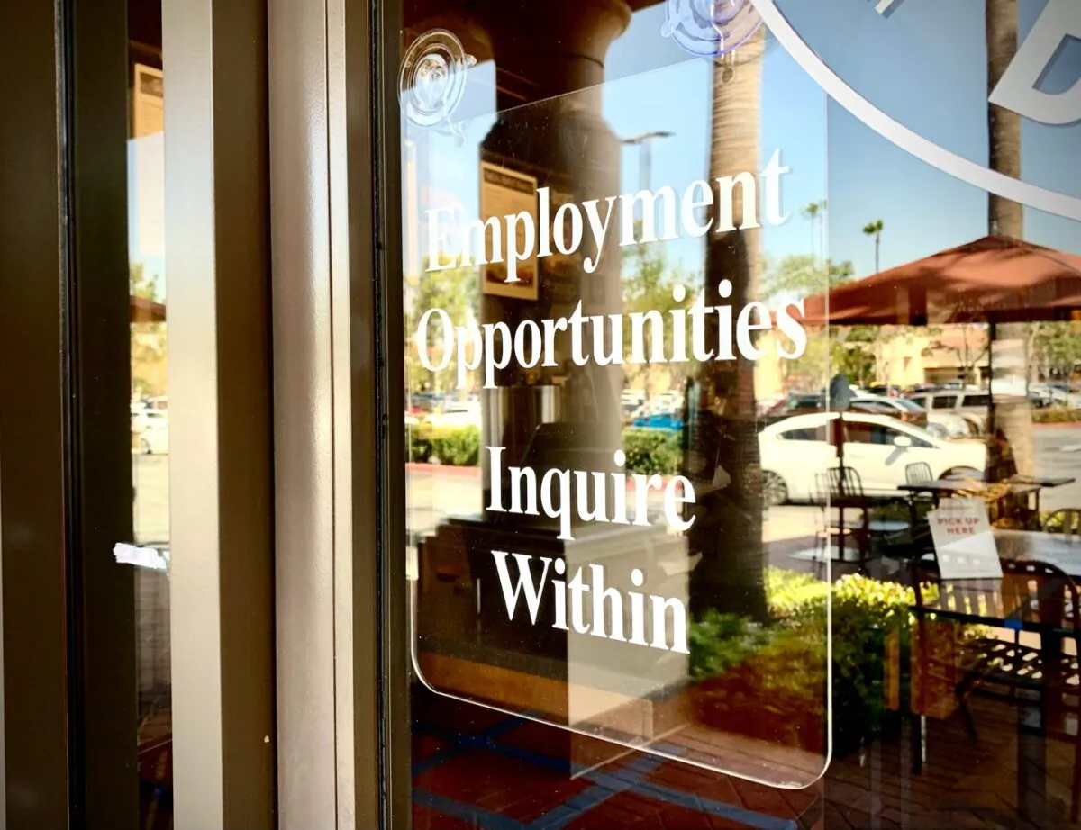 Employment opportunities are advertised at an Irvine, Calif. bagel shop on March 23, 2021. (John Fredricks/The Epoch Times)