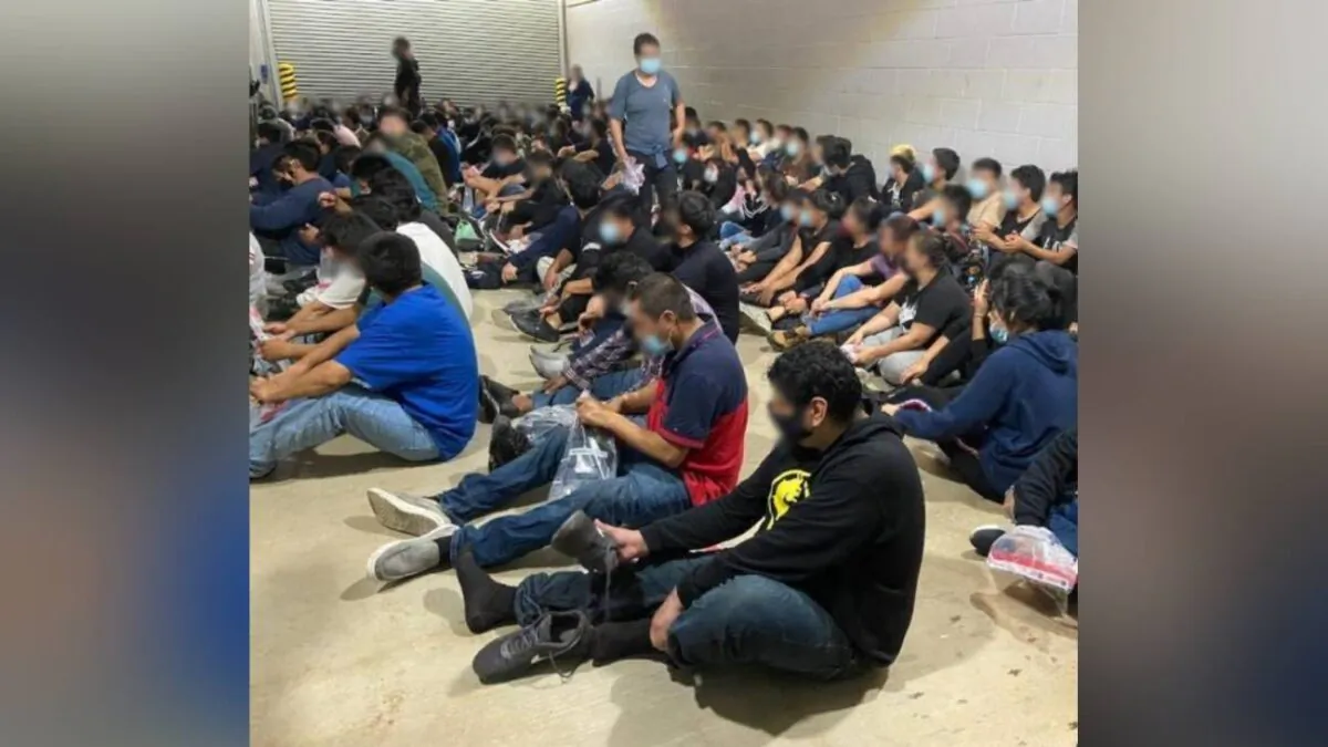 A group of illegal immigrants at a holding facility after being apprehended by U.S. Border Patrol agents near Laredo, Texas, on April 16, 2021. (U.S. Customs and Border Patrol)