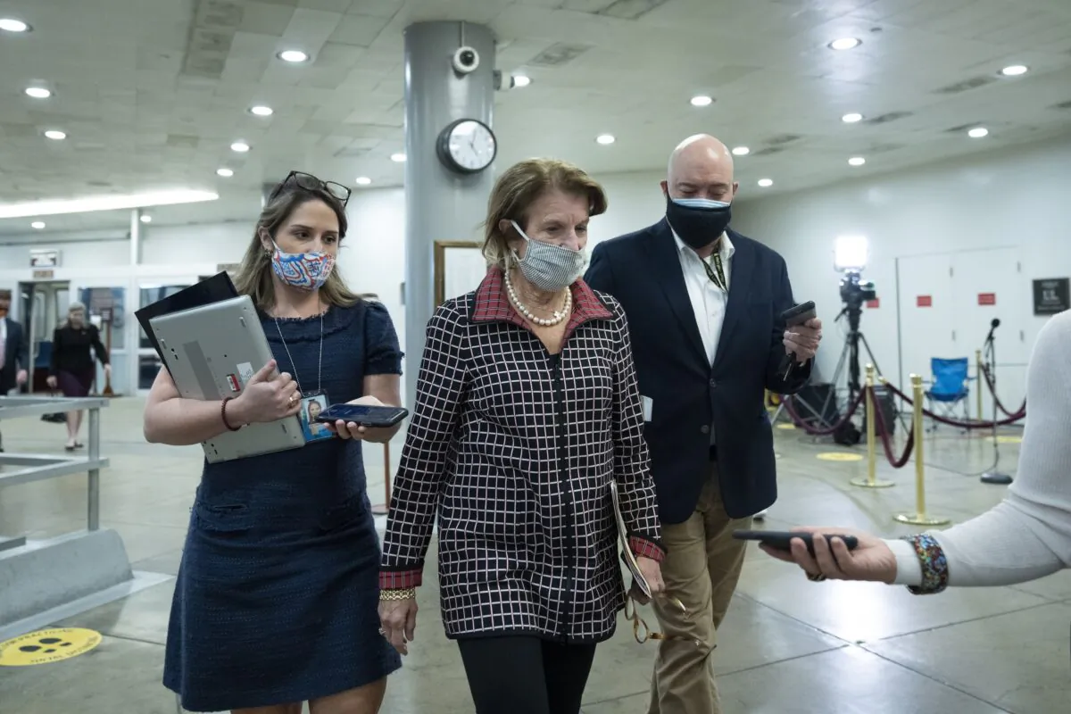 Sen. Shelley Moore Capito (R-Wa.) speaks to reporters in Washington on April 19, 2021. (Drew Angerer/Getty Images)