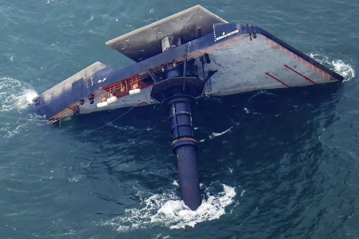The capsized lift boat Seacor Power is seen seven miles off the coast of Louisiana in the Gulf of Mexico, on April 18, 2021. (Gerald Herbert/AP Photo)