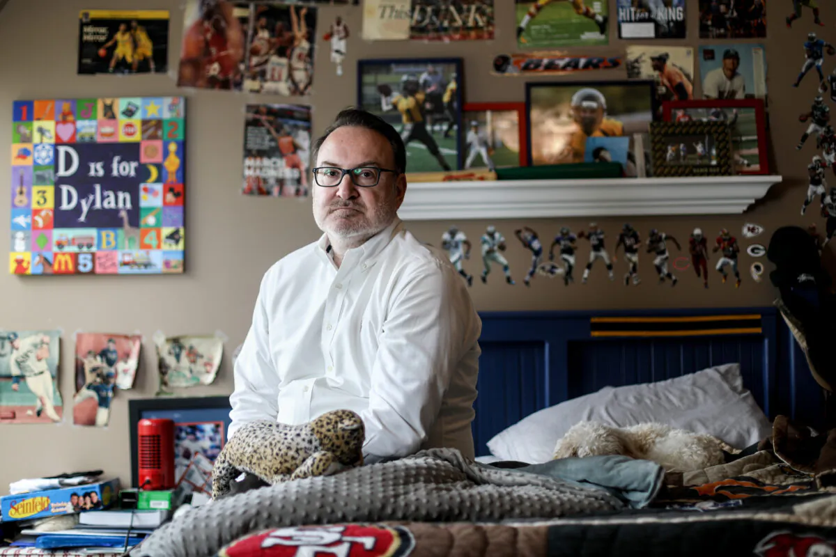 Chris Buckner in his son Dylan's room at his home in Northbrook, Ill., on April 16, 2021. (Samira Bouaou/The Epoch Times)