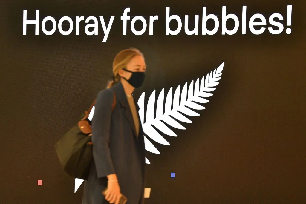 A traveller departs for New Zealand at Sydney International Airport on April 19, 2021, as Australia and New Zealand opened a trans-Tasman quarantine-free travel bubble.  (Photo by SAEED KHAN/AFP via Getty Images)