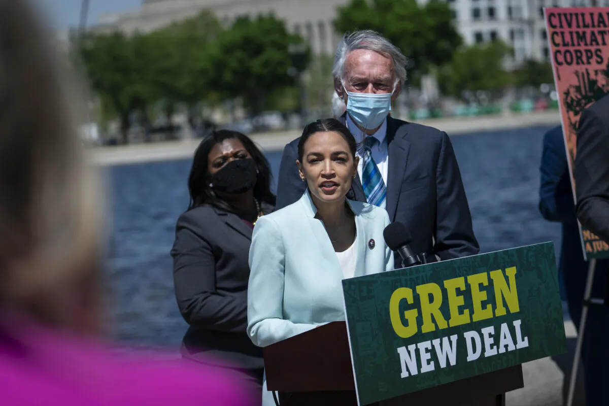 Rep. Alexandria Ocasio-Cortez (D-N.Y.) speaks at a news conference held to re-introduce the Green New Deal, in Washington, on April 20, 2021. (Sarah Silbiger/Getty Images)