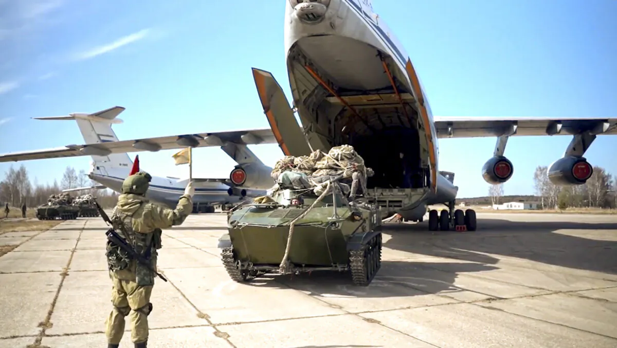 A Russian military vehicle preparing to be loaded into a plane for airborne drills during maneuvers in Crimea on April 22, 2021. (Russian Defense Ministry Press Service via AP)