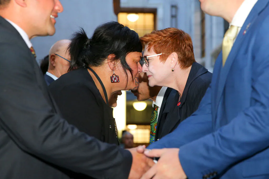 Australian Foreign Minister Marise Payne receives a hongi from Minister of Foreign Affairs Nanaia Mahuta during a Mihi Whakatau, or welcome speech, at Parliament in Wellington, New Zealand on April 22, 2021. (Hagen Hopkins/Getty Images)