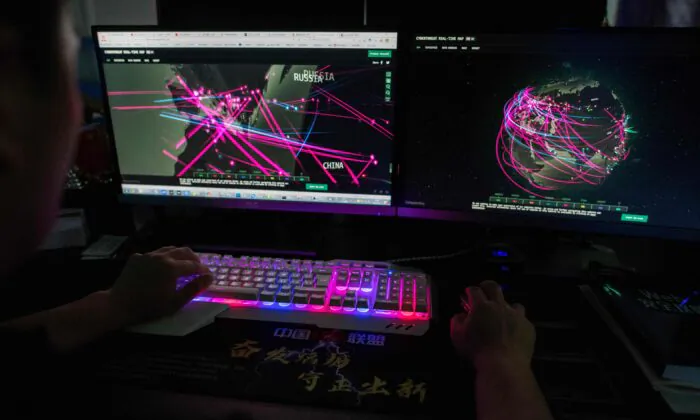 A hacker uses his computer in Dongguan, in China's southern Guangdong Province, on Aug. 4, 2020. (Nicolas Asfouri/AFP via Getty Images)