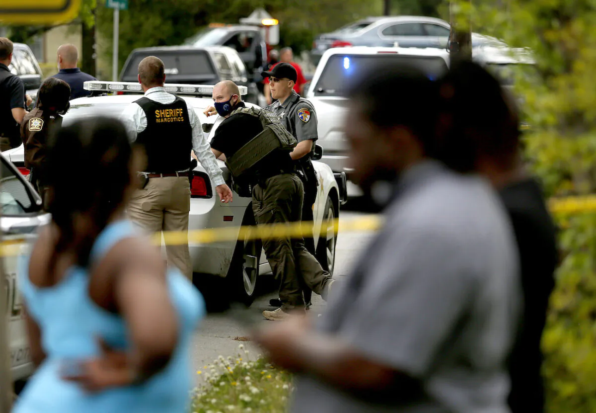Law enforcement investigate the scene of a police involved shooting, in Elizabeth City, N.C., on April 21, 2021. (Stephen M. Katz/The Virginian-Pilot via AP)