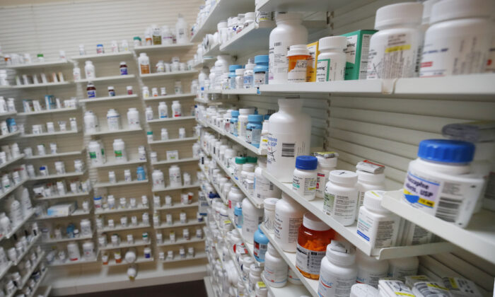 Bottle of pills sit on shelves at Rock Canyon Pharmacy in Provo, Utah on May 20, 2020. (George Frey/AFP via Getty Images)
