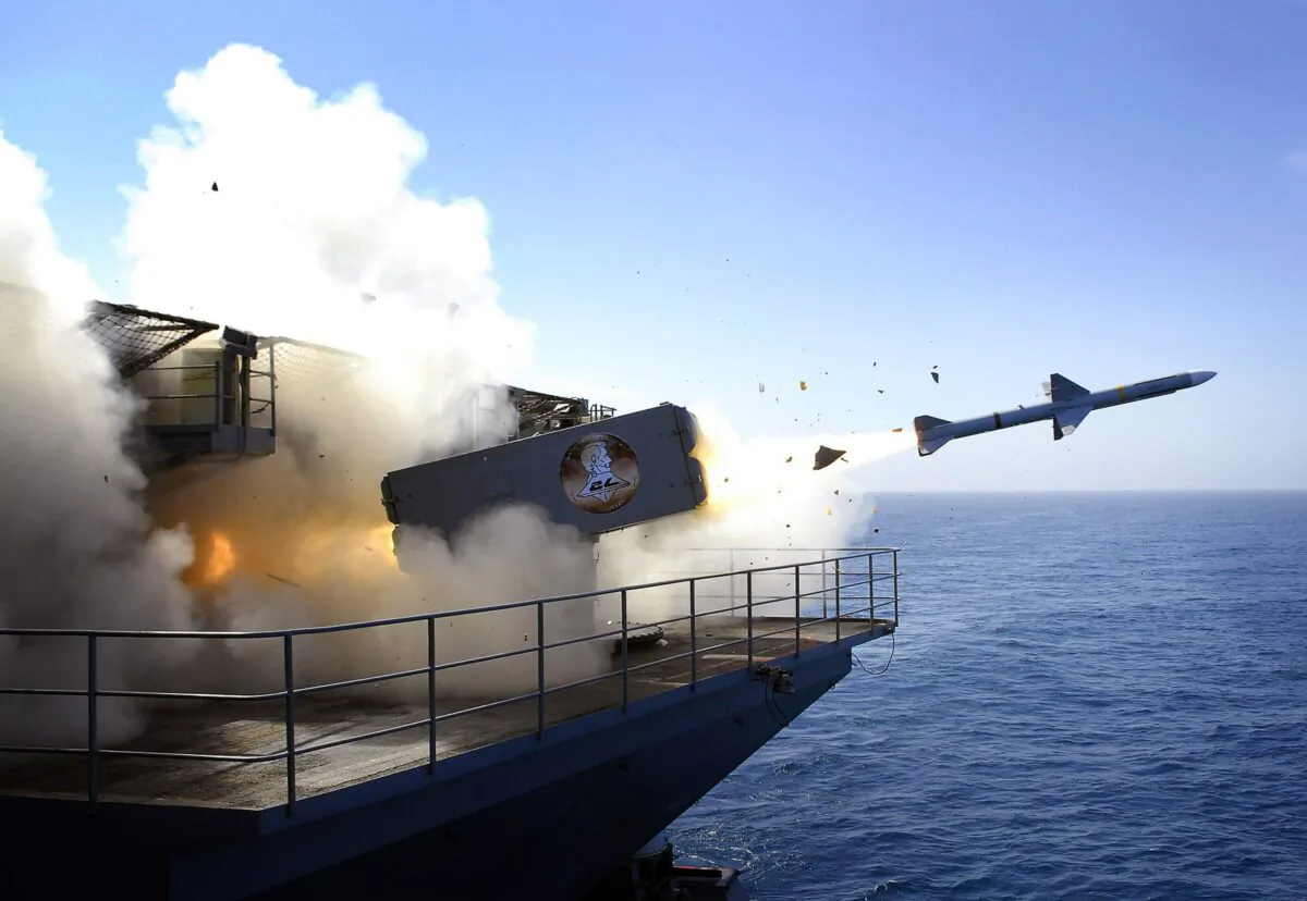 AT SEA - AUGUST 13:  In this handout photo provided by the U.S. Navy, a RIM-7P NATO Sea Sparrow Missile launches the Nimitz-class aircraft carrier USS Abraham Lincoln (CVN 72) during a stream raid shoot exercise on August 13, 2007 in the Pacific Ocean, At Sea. Lincoln's self-defense systems fired four Sea Sparrow missiles, engaging and destroying two BQM-74E turbojet-powered drone aircraft and a High-Speed Maneuvering Surface Threat (HSMST) remote controlled Rigid Hulled Inflatable Boat (RHIB) during the event. Lincoln and embarked Carrier Air Wing (CVW) 2 are underway off the coast of Southern California conducting Tailored Ship's Training Availability (TSTA). (Photo by Jordon R. Beesley/U.S. Navy via Getty Images)