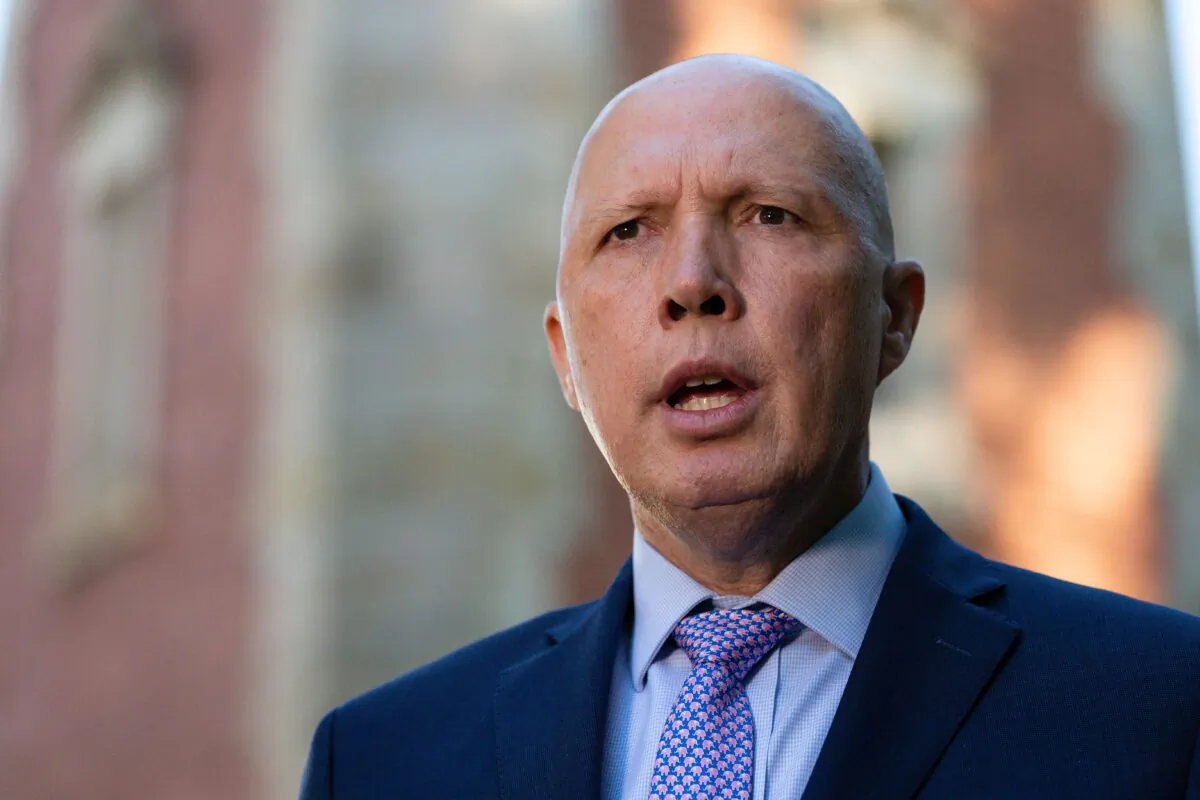 Australian Defence Minister Peter Dutton addresses media in front of the Subiaco War Memorial in Perth, Australia on April 19, 2021. (AAP Image/Richard Wainwright)