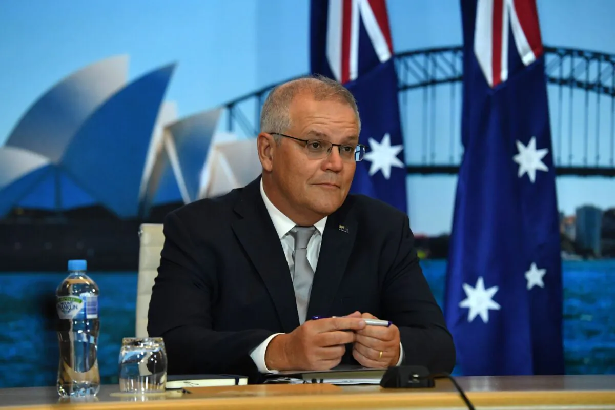 Prime Minister Scott Morrison looks on for the opening remarks of the Leaders Summit on Climate hosted by United States President Joe Biden, in Sydney, Australia on April 22, 2021. (AAP Image/Mick Tsikas)