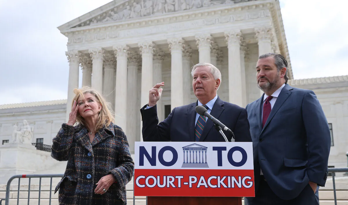 Senate Judiciary Committee members Sen. Marcia Blackburn (R-Tenn.), Sen. Lindsey Graham (R-S.C.), and Sen. Ted Cruz (R-Texas) hold a news conference to voice their opposition to adding justices to the U.S. Supreme Court outside the court's building in Washington on April 22, 2021. (Chip Somodevilla/Getty Images)
