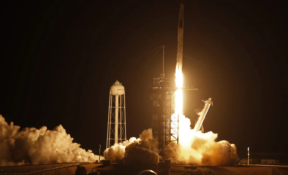 A SpaceX Falcon 9 rocket, with the Crew Dragon capsule, is launched carrying four astronauts on a NASA commercial crew mission to the International Space Station at Kennedy Space Center in Cape Canaveral, Fla., on April 23, 2021. (Joe Skipper/Reuters)