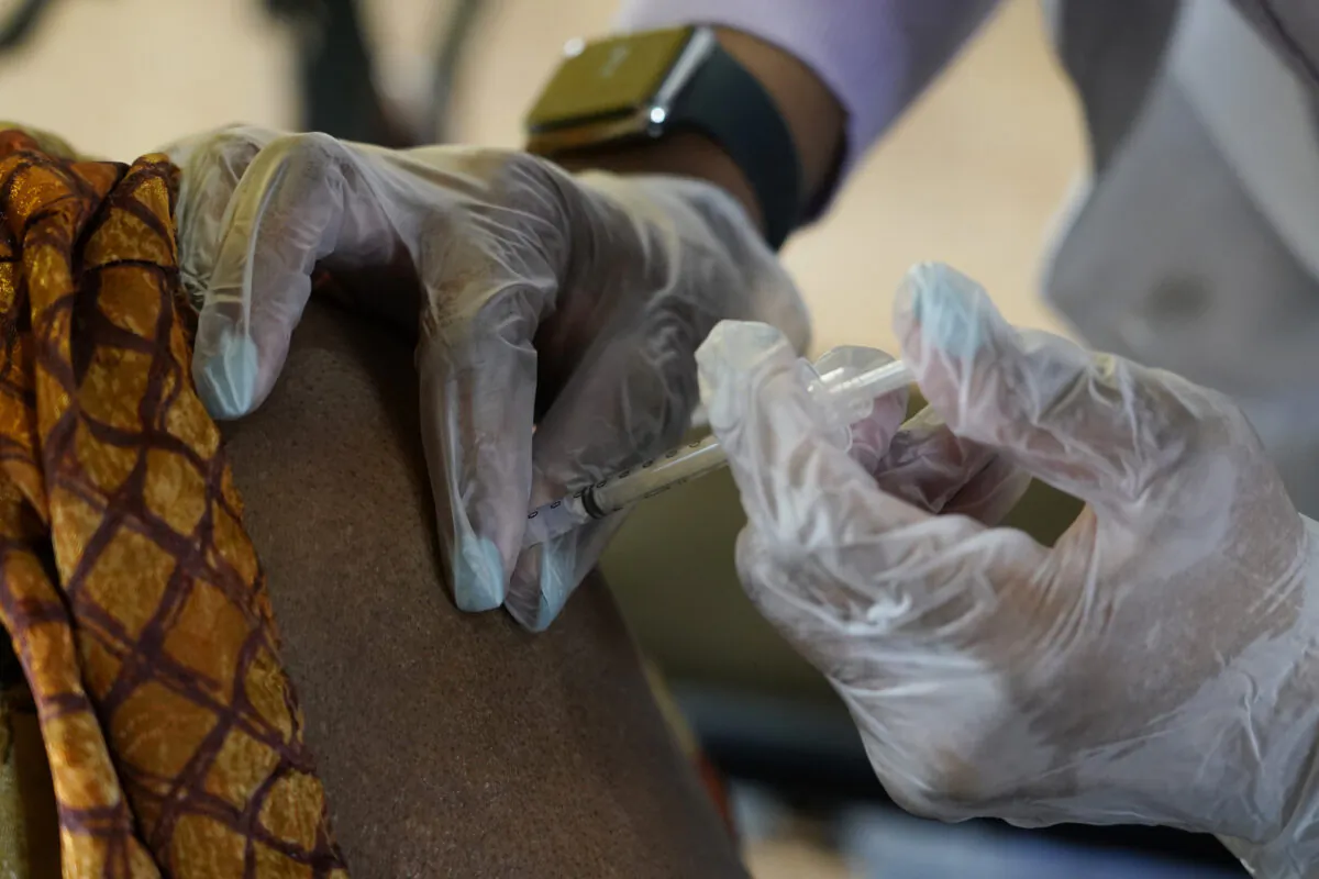A person gets a COVID-19 vaccine in Jackson, Miss., on Jan. 12, 2021. (Rogelio V. Solis/AP Photo)