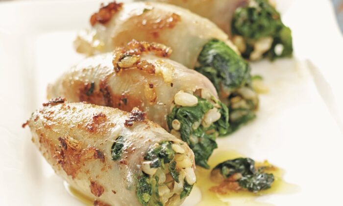 Fresh baby squid, stuffed with an herbed rice-and-spinach filling and simmered until tender, offer a dreamy taste of the Mediterranean. (Photo from "The Ultimate Mediterranean Diet Cookbook" by Amy Riolo)