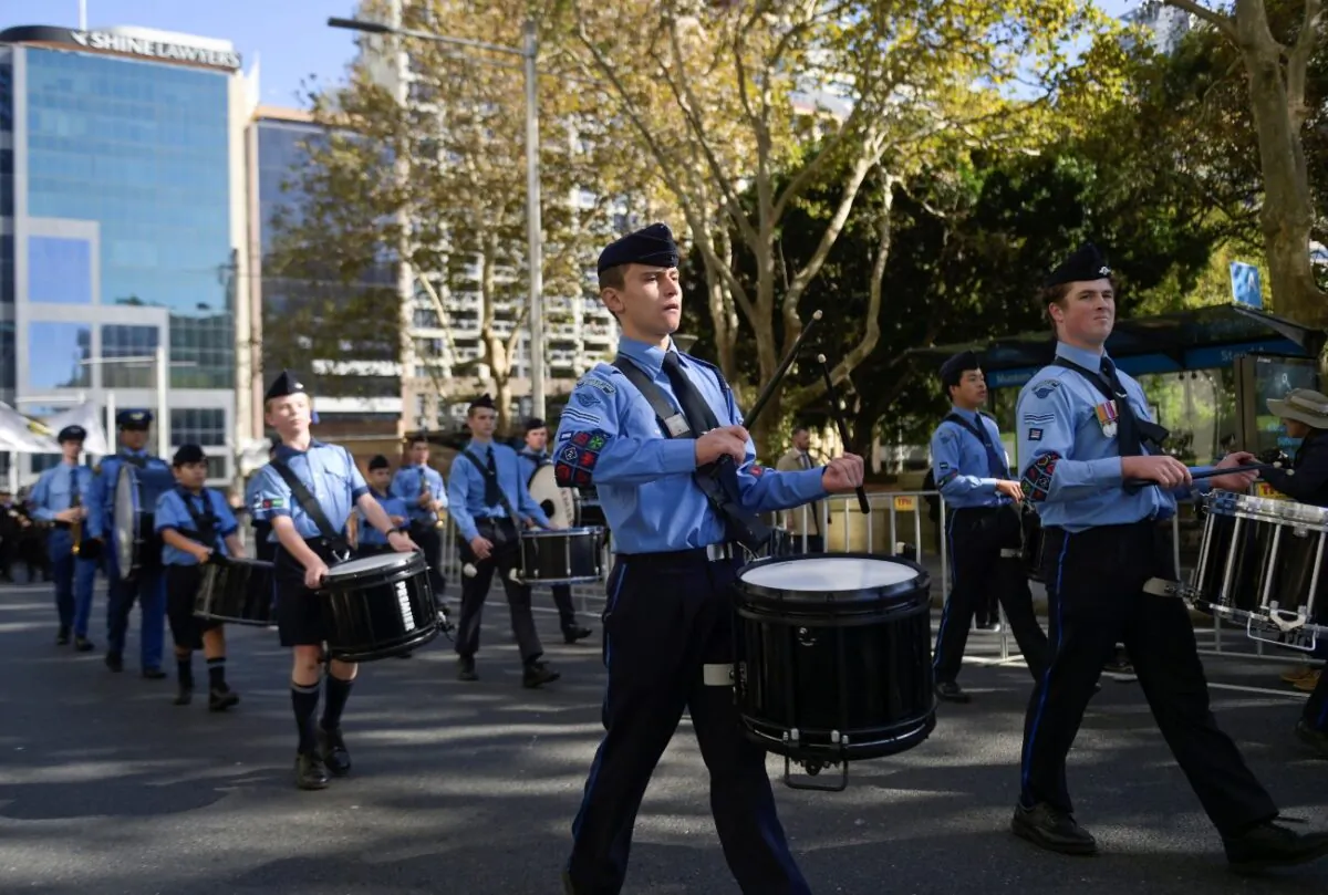 A uniformed services band performs as Australian military personnel, past and present, commemorate ANZAC Day during a march through the city centre in Sydney, Australia, on April 25, 2021. (Jaimi Joy/Reuters)