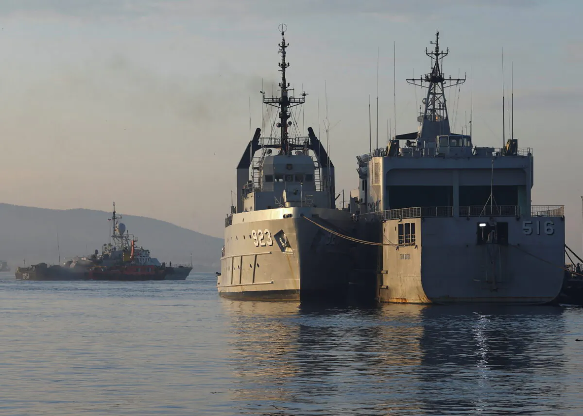 Indonesian Navy's ships at the Tanjung Wangi port as the search continues for the missing KRI Nanggala-402 submarine in Banyuwangi, East Java Province, Indonesia, on April 25, 2021. (Ajeng Dinar Ulfiana/Reuters)