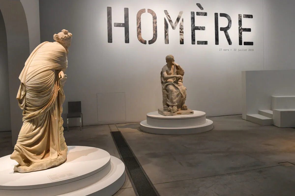Statues are on display at the Louvre Lens museum during the press visit of the exhibition about Greek poet Homer, in Lens, northen France, on March 26, 2019. (Denis Charlet/AFP via Getty Images)