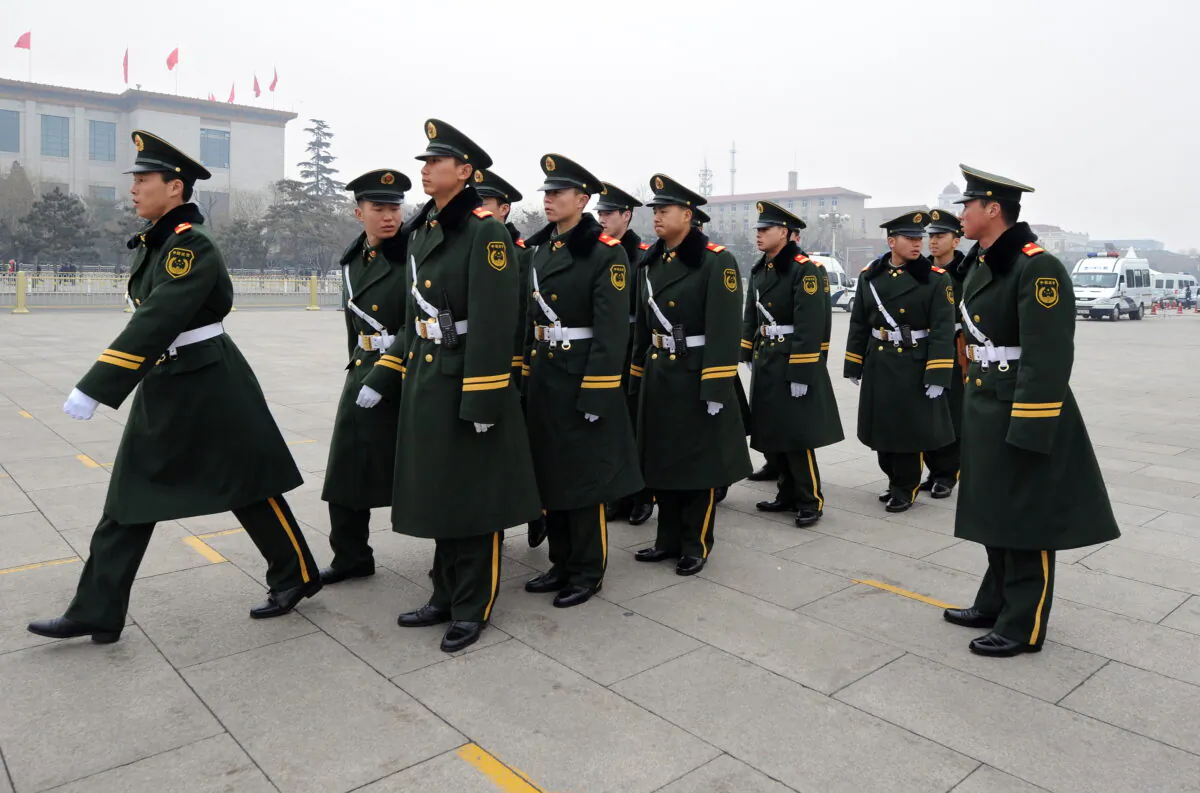 Chinese paramilitary police prepare to march on Tiananmen Square in Beijing on March 4, 2010. (Frederic J. Brown/AFP via Getty Images)
