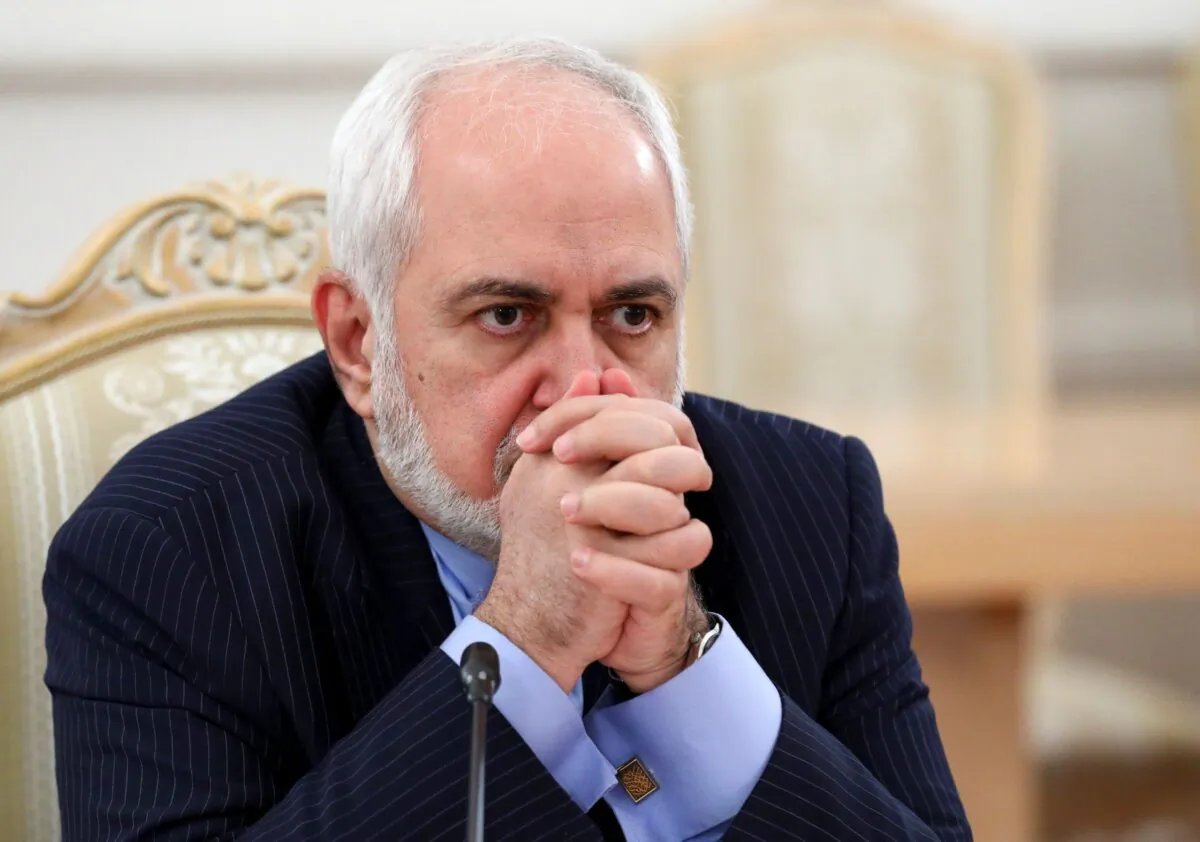 Iranian Foreign Minister Mohammad Javad Zarif listens joint statement at the European headquarters of the United Nations in Geneva, Switzerland, on Dec. 18, 2018. (Salvatore Di Nolfi/Keystone via AP)
