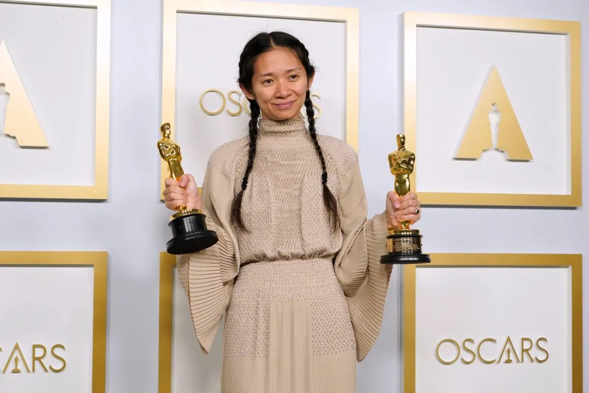 Chloe Zhao, winner of the awards for best picture and director for "Nomadland," poses in the press room at the Oscars at Union Station in Los Angeles, Calif., on April 25, 2021. (Chris Pizzello/Pool/AP Photo)