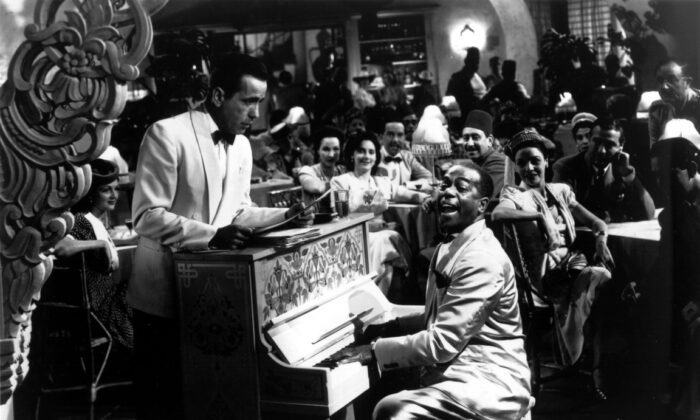 Rick (Humphrey Bogart, L) and Sam (Dooley Wilson), in "Casablanca." (Warner Bros.)

