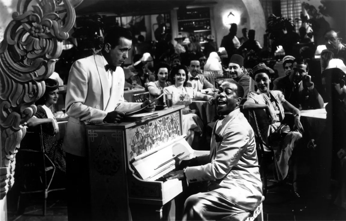 Rick (Humphrey Bogart, L) and Sam (Dooley Wilson), in "Casablanca." (Warner Bros.)
