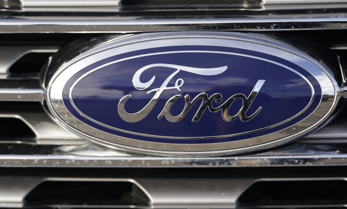The blue oval logo of Ford Motor Company is shown in east Denver, Colo., on April 25, 2021. (David Zalubowski/AP Photo)