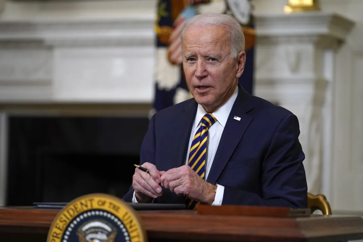 President Joe Biden pauses after signing an executive order relating to U.S. supply chains, in the State Dining Room of the White House in Washington on April 24, 2021. (Evan Vucci/AP Photo)