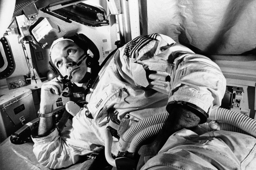 Apollo 11 command module pilot astronaut Michael Collins takes a break during training for the moon mission, in Cape Kennedy, Fla., on June 19, 1969. (AP Photo)