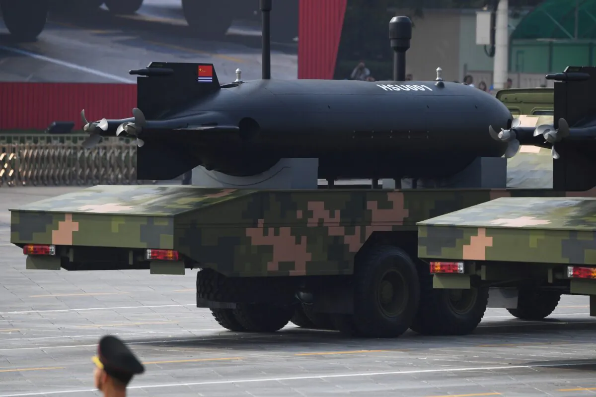 China's HSU001 underwater drones are seen during a military parade at Tiananmen Square in Beijing on Oct. 1, 2019. (Greg Baker/AFP via Getty Images)