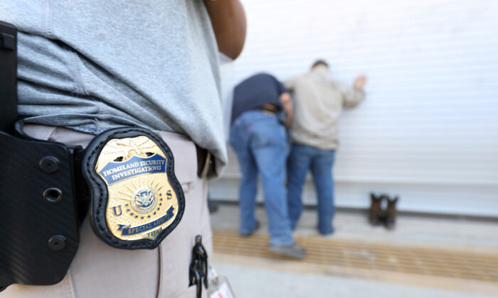 Immigration and Customs Enforcement's Homeland Security Investigations officers execute a criminal search warrant in Texas, in an August 2018 photo. (ICE/via Reuters)