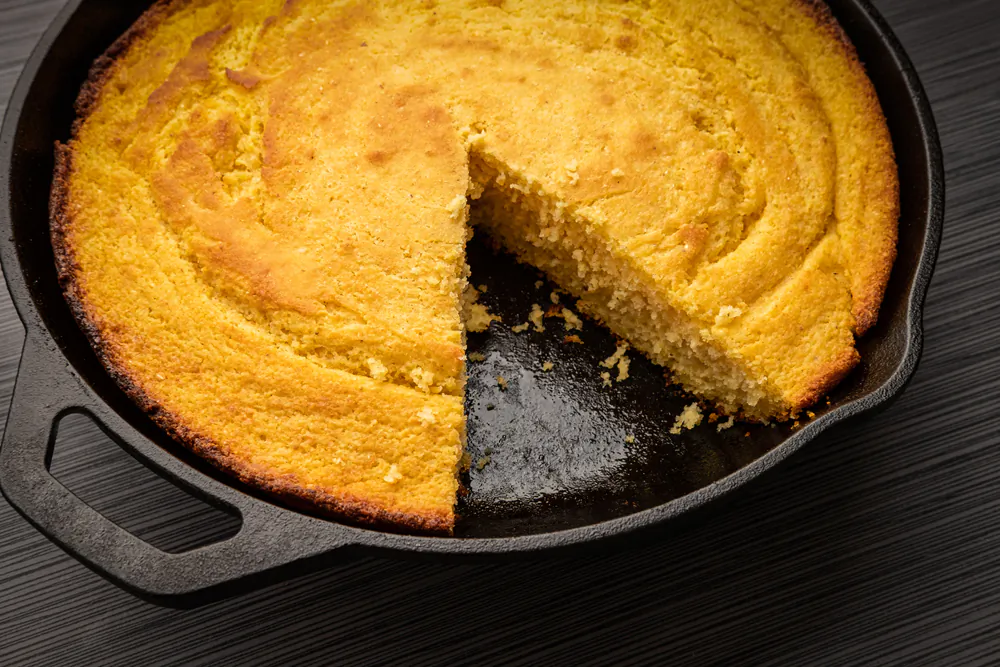 Cast iron gives cornbread a crisp, dark golden crust. (Bruce Peter/Shutterstock)