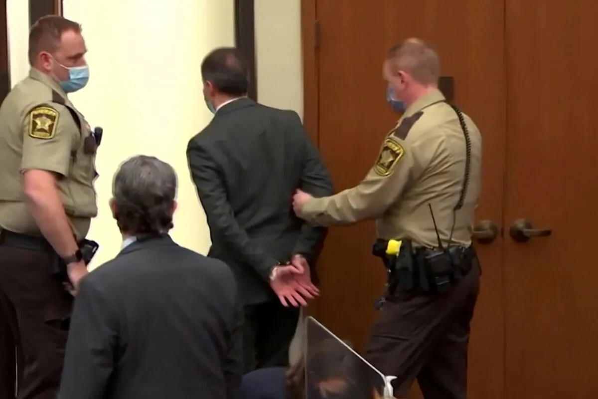 Former Minneapolis police officer Derek Chauvin is led away in handcuffs past his defense attorney Eric Nelson after a jury found him guilty of all charges in his trial for second-degree murder, third-degree murder, and second-degree manslaughter in the death of George Floyd in Minneapolis, on April 20, 2021. (Screenshot /Pool via Reuters)
