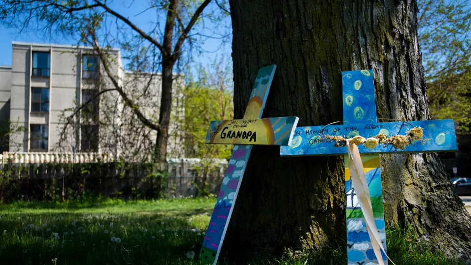 Crosses are displayed outside the Camilla Care Community centre marking the deaths of multiple people that occurred during the COVID-19 pandemic in Mississauga, Ont., on May 26, 2020. (Nathan Denette/The Canadian Press)