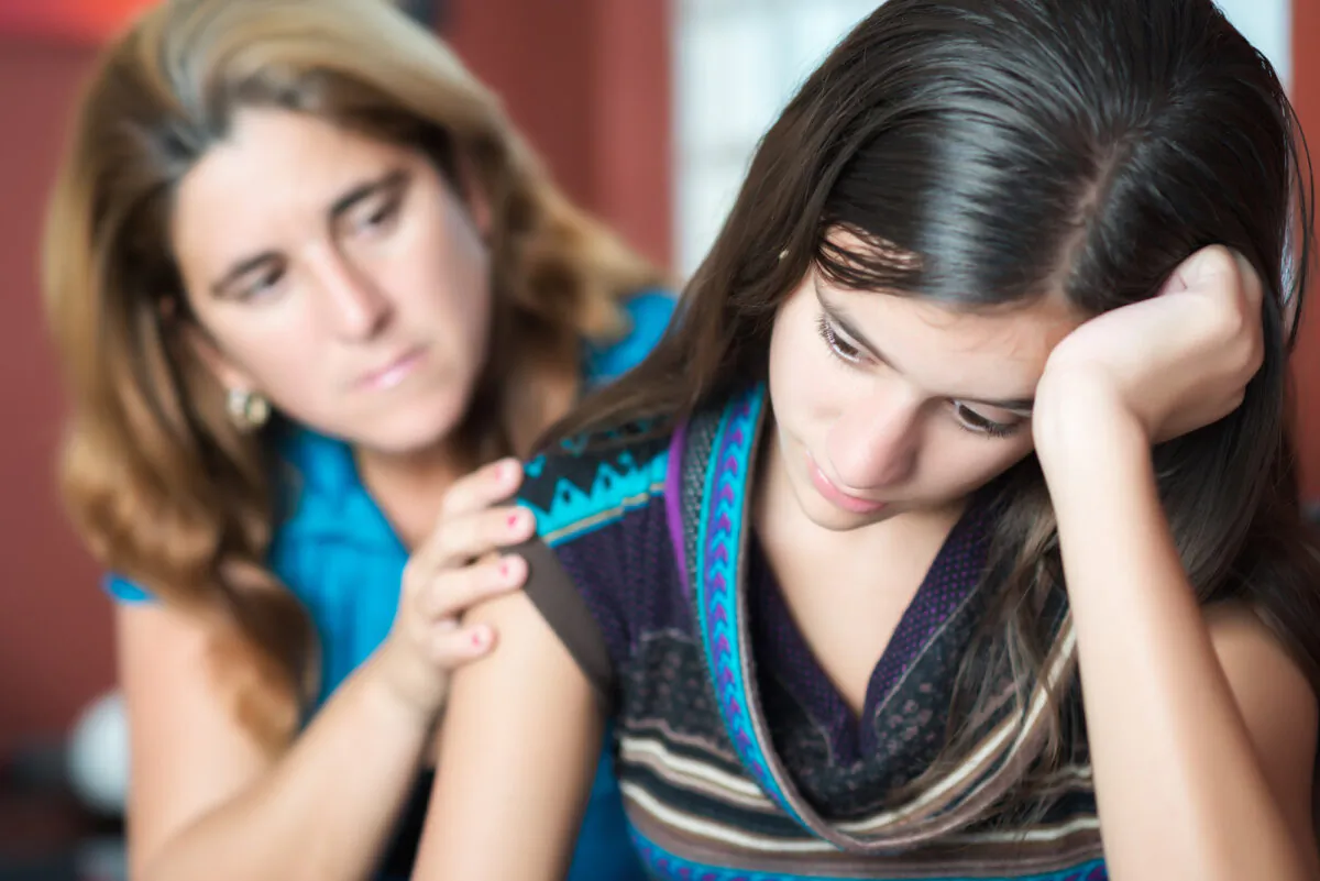 Teens’ moods can fluctuate wildly, but after several years it eventually dissipates in most teens. Parents can help during this tumultuous time by giving them understanding, attention, and affirmation. (Kamira/Shutterstock)