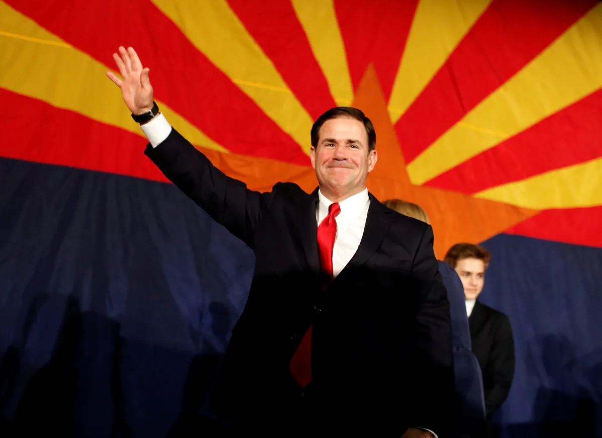 Arizona Gov. Doug Ducey greets the GOP midterm elections watch party after being re-elected in Phoenix, Arizona, on Nov. 6, 2018. (Nicole Neri/Reuters)
