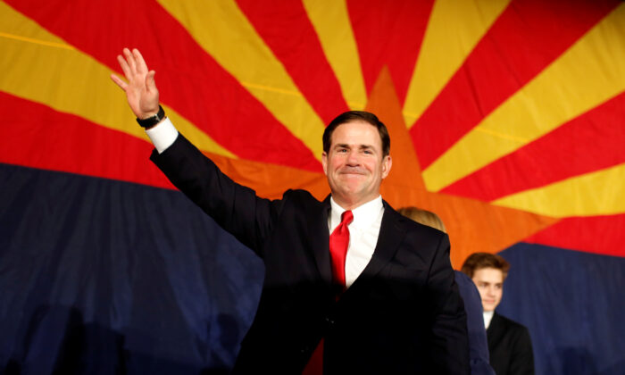 Arizona Gov. Doug Ducey greets the GOP midterm elections watch party after being re-elected in Phoenix, Arizona, on Nov. 6, 2018. (Nicole Neri/Reuters)