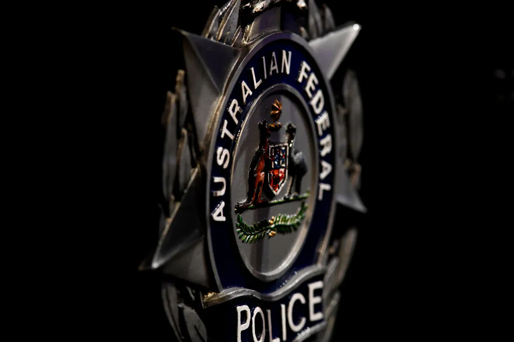 The Australian Federal Police badge is seen in Canberra, Australia on Jun. 6, 2019 (Photo by Getty Images)
