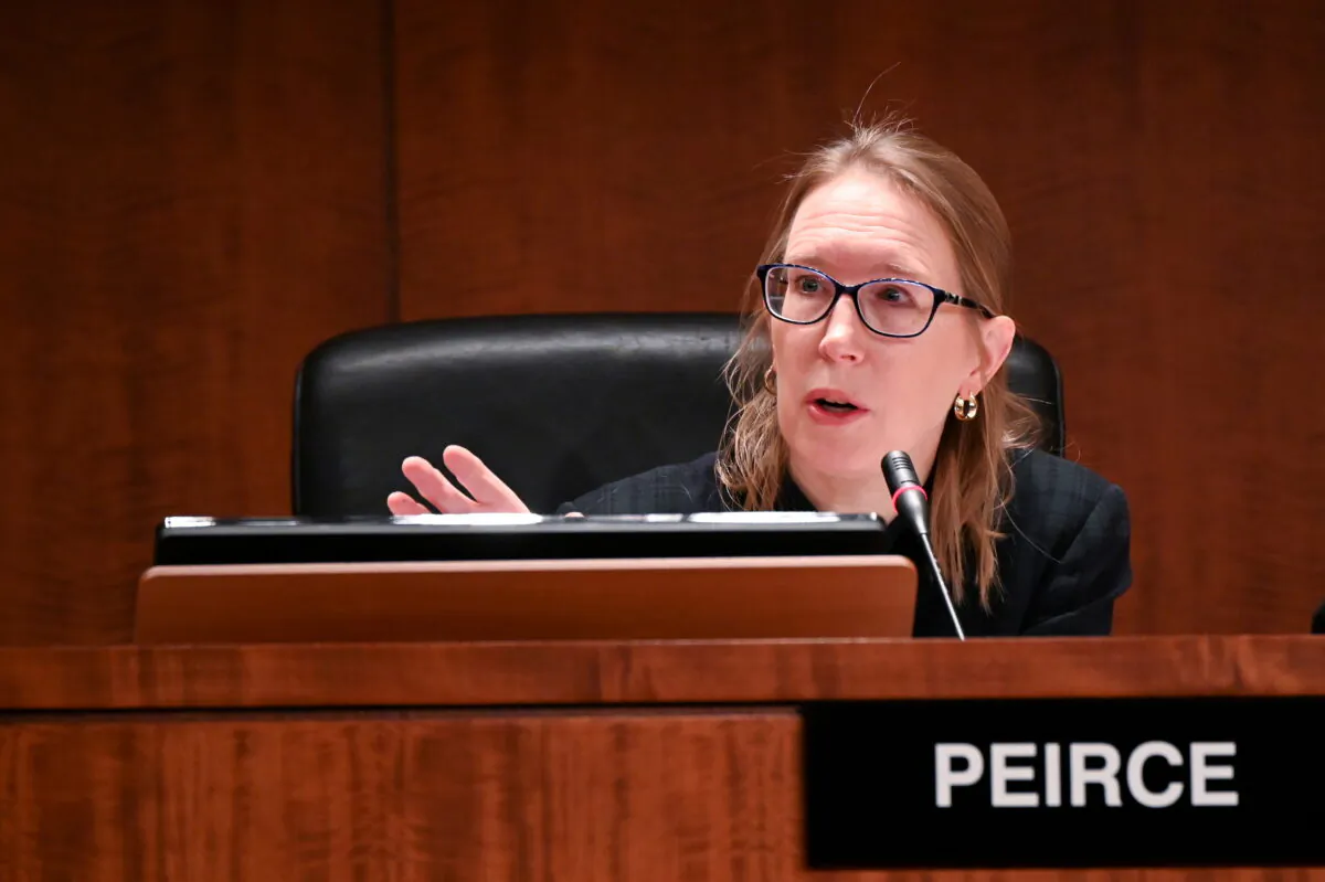 Commissioner Hester Peirce participates in a U.S Securities and Exchange Commission open meeting to propose changing its decades-old definition of an "accredited investor" in order to allow more Americans to buy shares in private companies, in Washington, on Dec. 18, 2019. (Erin Scott/Reuters)