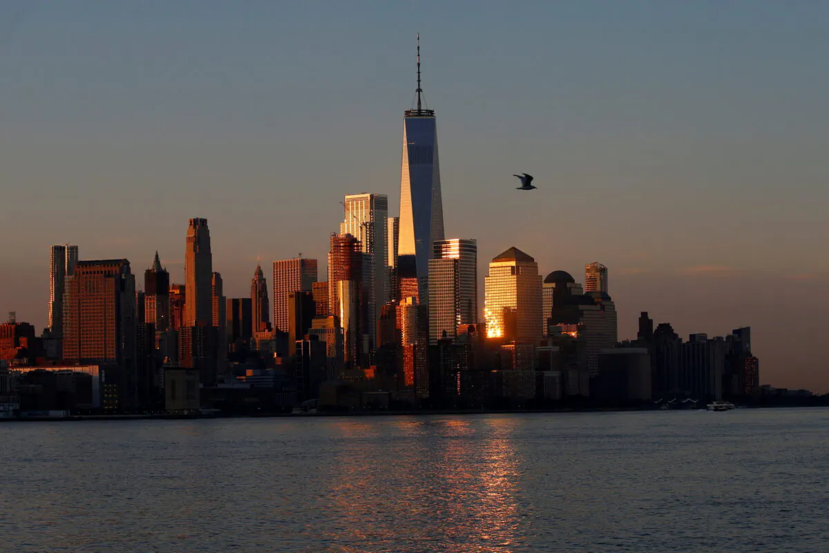 A view of the One World Trade Centre tower and the lower Manhattan skyline of New York City at sunrise as seen from Hoboken, N.J., on Aug. 9, 2017. (Mike Segar/Reuters)